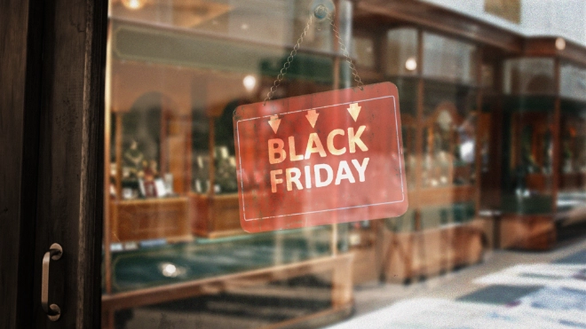Red black friday sign in a glass window