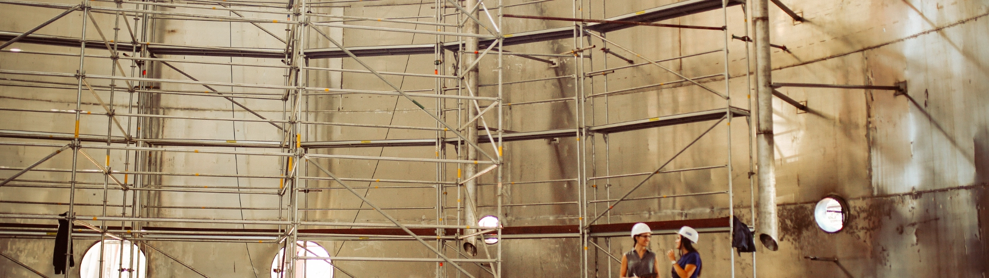 Two female construction workers talking